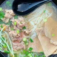 Beef Pho · Rare eye round and brisket in simmering complex beef broth, served with veggies and rice noo...