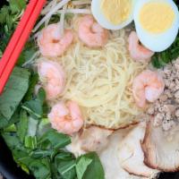 Ramenlicious · Slow cooked sliced pork, shrimp, and ground pork, served in a vegetarian broth with a hard b...