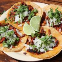 Order Of (4) Tacos · The order of tacos includes 4 tacos of meat of your choice and a side of Charro beans