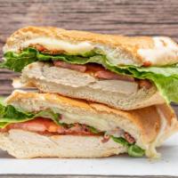 Chicken Club · Grilled chicken breast, bacon, Swiss cheese, lettuce, tomatoes and ranch dressing.