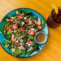 Strawberry Fields · Strawberries, bacon, toasted almonds, spinach, feta, and red wine vinaigrette.