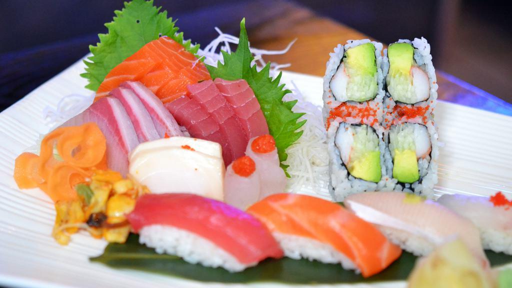 Sushi & Sashimi Combo · Six pieces sashimi, six pieces sushi and eight pieces California roll. Served with soda or miso soup.