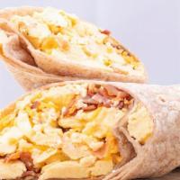 The Essential Wrap · Eggs, Bacon and Cheddar cheese on a Tomato wrap.  Served with a side of our homemade Agave a...