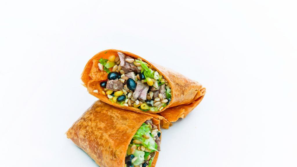 Carne Asada · Grilled carne asada, avocado, black beans, corn, hearts of romaine, farro, tossed with our homemade agave and jalapeño vinaigrette, chipotle chili wrap.