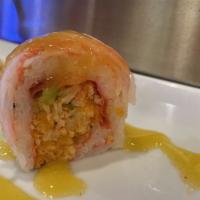 Mango Tango · Spicy tuna wrap with raw fish and crunch topped with mango Thai sweet chili sauce.
