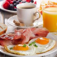 The Two Egg & Ham Big Breakfast · Two fresh eggs cooked your way with our seasoned, skillet browned home fries, sliced ham and...