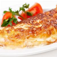 Classic Three Egg Omelet With Cheese & Sausage · Fluffy, buttery, three egg omelet topped with melty Jack-Cheddar mix and savory breakfast sa...