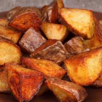 Home Fries · Rustic, seasoned, skillet browned breakfast potatoes.
