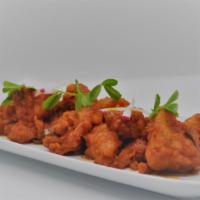 Chilli Chicken · This most popular Indo-Chinese spicy food is marinated with spices, deep fried and cooked on...