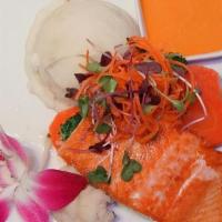Salmon En Escabeche · Red salmon served with a mix of cherry tomato, passion fruit and celery. Served with malanga...