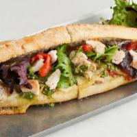 Chicken Pesto · house grilled chicken, roasted red pepper, basil pesto, aged provolone, spring mix, lemon ai...