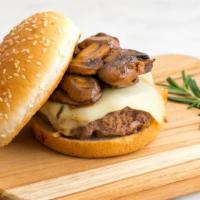 Swiss Mushroom Burger · Classic swiss cheeseburger with 1/2 lb Angus beef patty, BBQ sauce, Swiss cheese, Grilled on...