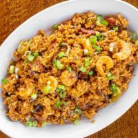 Jambalaya (Small) · Cajun rice with sausage, shrimp, celery, bell peppers, white onions and topped with green on...