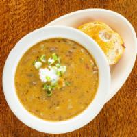 Crawfish Etouffeé (Small) · A thick crawfish stew, made with celery, bell peppers, onions, mushrooms, served with a scoo...