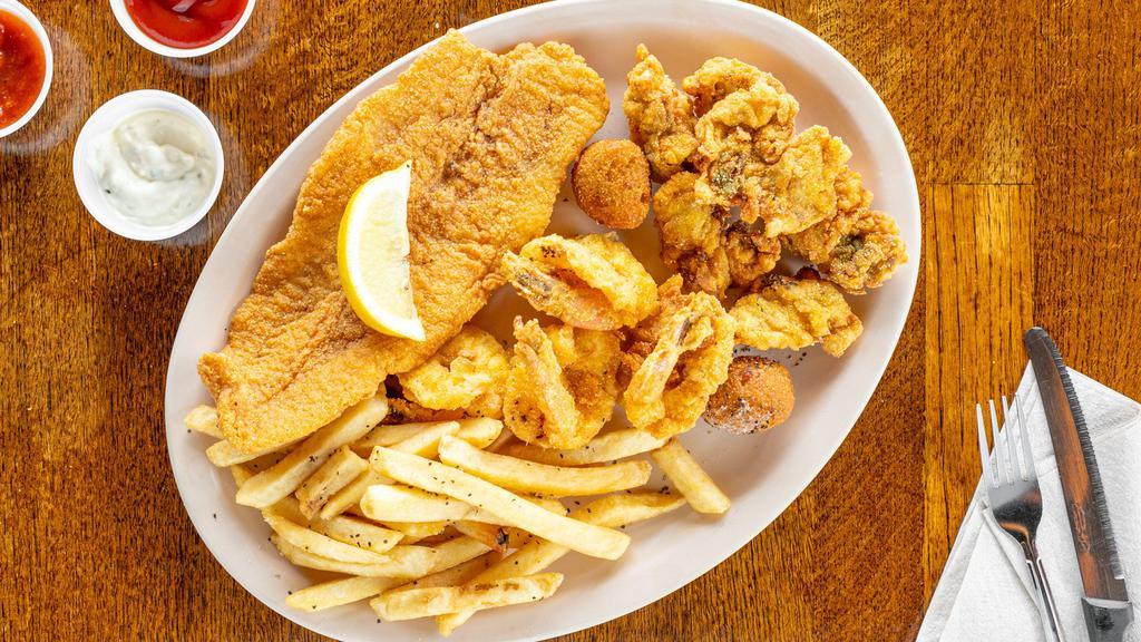 Combo · Blackened or fried fish fillet, four blackened or fried  shrimp, and six fried oysters.