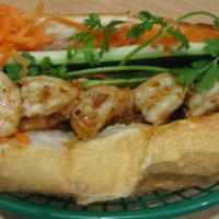 128 - Shrimp Hoagie · Grilled shrimp, butter, sautéed scallions, house sauce, pickled carrots, cucumber, jalapeño ...