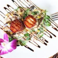 Capesante · Seared scallops wild mushrooms, roasted corn, spinach and balsamic reduction.