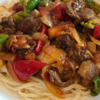 Goyru Laghman · Fresh hand-pulled noodles topped with beef and vegetables.