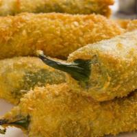 Stuffed Jalapenos · Cream cheese stuffed jalapeno served with chipotle ranch.