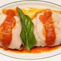 Eggplant Rollatini · Two eggplant rolls, stuffed with four cheese blend and baked in marinara.