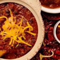Chili Bowl · A bowl of our 4 different chili peppers, spices, 2 beans & top quality ground beef chili. Ch...