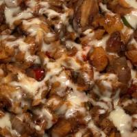 Loaded Fries · Choice of your meat with crispy fries covered in cheese and brown gravy. Top it of with our ...