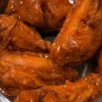 12 Party Wings · Freshly hand battered and fried to order.