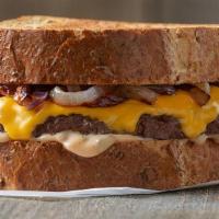 Patty Melt · All-natural beef, American cheese, grilled onion & our special sauce on toasted rye bread.