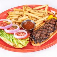 Steak Sandwich · Marinated skirt steak grilled and placed on a sourdough roll brushed with garlic butter, Mon...