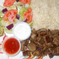 Gyro Platter · Gyro meat served over white basmati rice and salad