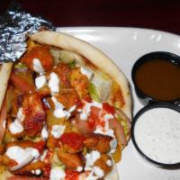 Chicken Gyro · served with lettuce, tomato, onions and white sauce