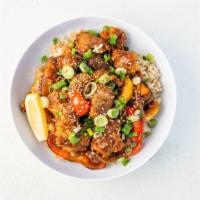 Orange Chicken Bowl · Oven-fried chicken sautéed with Orange Sauce, peppers & onions, green onions, and sesame see...