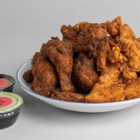 20 Wings Or Tenders With 2 Dipping Sauces · marinated in our signature sweet and spicy dry rub for 24 hours, smoked over hickory wood th...