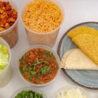 Family-Style Taco Bundle  (Serves 6-8) · Bring our Catering Style Taco Bar Home for 6-8 People. Includes Tortillas, Protein, Rice, Be...