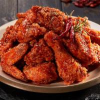 Red Hot Pepper Chicken · Crispy and tender chicken tossed in our addictive gochujang sauce. Spicy.