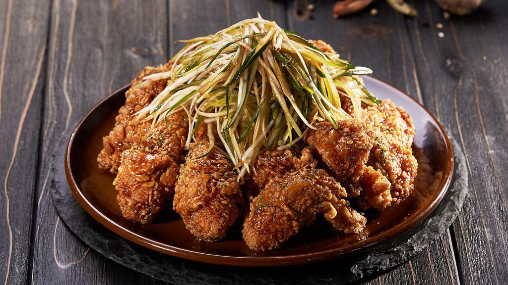 Soy Garlic Spring Onion Chicken · Crispy chicken smothered in a soy glaze, and topped with sliced spring onions mixed in our soy garlic seasoning.
