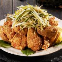 Lemon Spring Onion Chicken · Crispy chicken topped with sliced spring onions, and mixed in our signature lemon dressing.