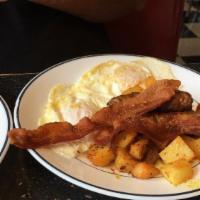 Big Dog · Eggs, two bacon slices, two sausages, two biscuits with gravy home fries.