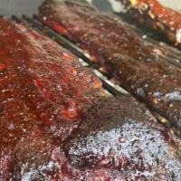 Pork Baby Back Ribs Plate · Baby back ribs smoked to perfection, smothered with house made BBQ sauce, comes with side of...
