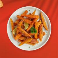 Sweet Spuds · Thick-cut sweet potato wedges fried until golden brown