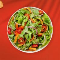 The Salad Builder · Build your own salad with your choice of toppings tossed with your choice of dressing.