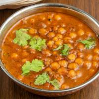 Chana Masala · Chickpeas cooked with tomatoes & spices.