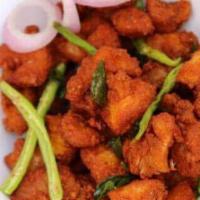Chicken Pakora · Turned overstuffed with spices and flour.