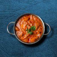 Chicken Tikka Tango · Chargrilled chicken morsels slow-cooked in a rich onion and tomato gravy with generous amoun...