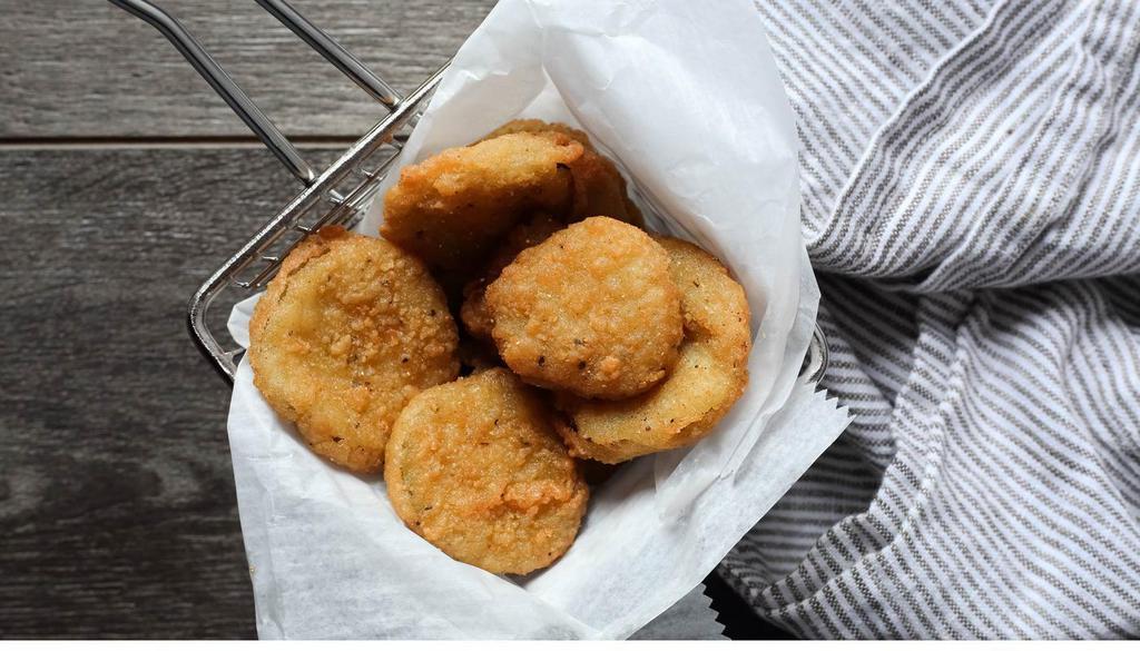 Fried Pickles · Crispy-fried, hand-breaded dill pickles  with bbq ranch for dippin’.