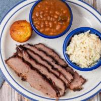 Texas Brisket Plate · Smoked 12-13 hrs, sliced-to-order. Served with two Southern Sides.