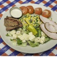 Smokehouse Salad · Smoked turkey, Texas brisket, cheddar & jack cheeses, roasted corn relish, cucumbers,  red o...