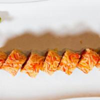 Angel Roll · Spicy. Spicy tuna, shrimp tempura, and mango inside with crab salad on top drizzled with hon...