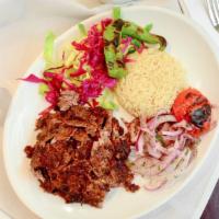 Doner Kebab Platter · Gluten free. Thinly sliced homemade lamb and veal doner kebab served with rice, tomato, and ...