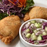 Curry Puffs · Chicken and potatoes (or) vegetarian with sweet and savory Thai spices in crisp pastry pocke...
